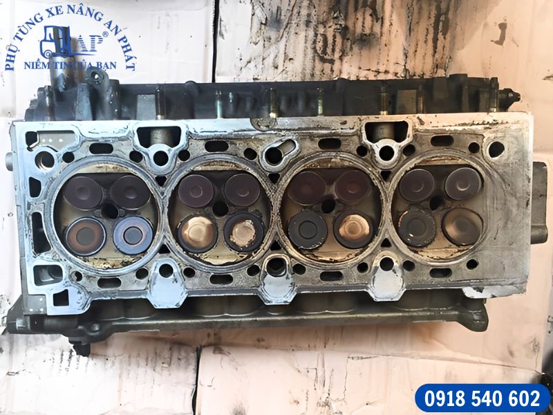 Hướng dẫn sửa nhanh hệ thống làm mát xe nâng kém hiệu quả 9 Gioăng quy lát xe nâng biến dạng gây rò rỉ